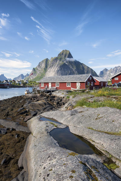 Typical houses of fishermen and in background the mountains, Reine, Moskenes, Lofoten Islands,Norway, Europe