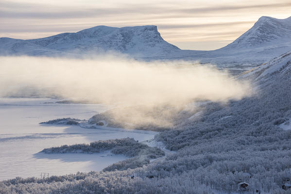 Sunrise on the snowy landscape, Bjorkliden, Abisko, Kiruna Municipality, Norrbotten County, Lapland, Sweden, Europe