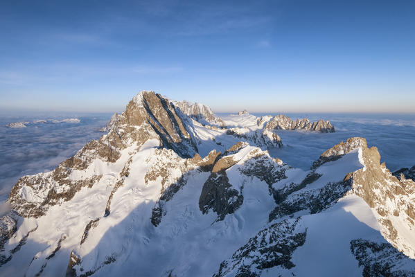 Aerial view of Grandes Jorasses and Mont Blanc in background  during sunrise, Courmayeur, Aosta Valley, Italy, Europe