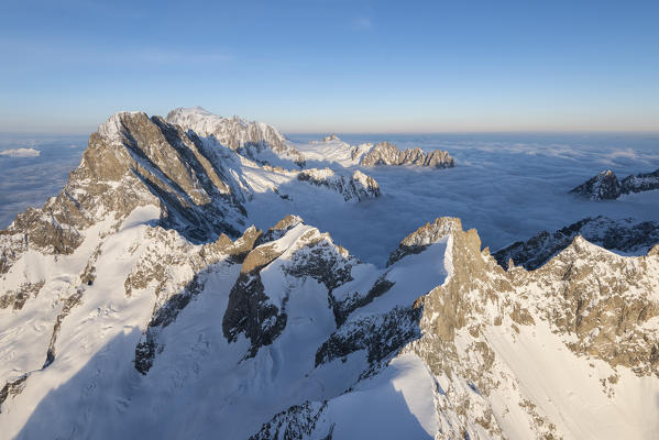 Aerial view of Grandes Jorasses and Mont Blanc in background  during sunrise, Courmayeur, Aosta Valley, Italy, Europe