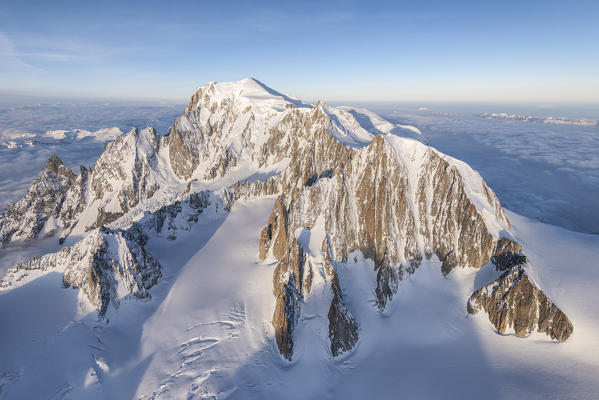 Aerial view of snowy peaks of Mont Blanc 7during sunrise, Courmayeur, Aosta Valley, Italy, Europe