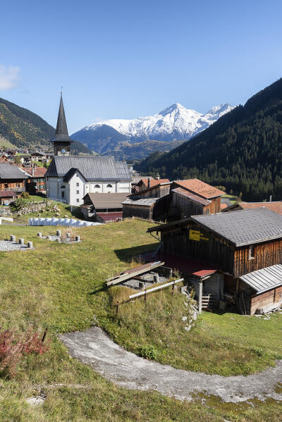 Little village of Tujetsch and in background Piz Muraun, Grisons Canton, Switzerland