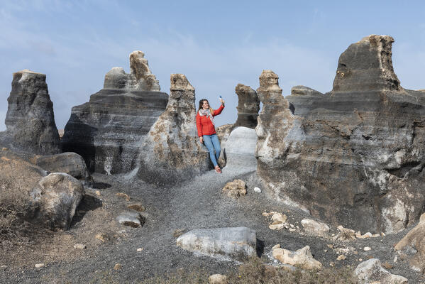 Young girl takes a selfie at antigua rofera de Teseguisete, Lanzarote, Canary Island, Spain, Europe 