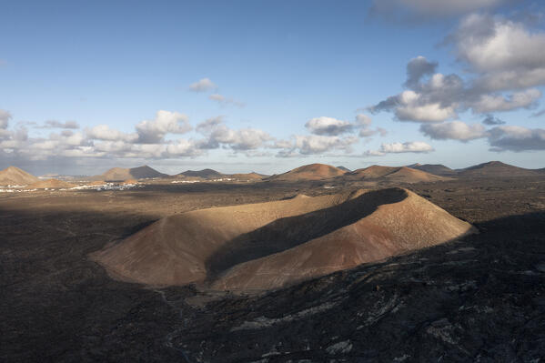 The view of Caldereta crater from the Calderla Blanca in the National Park of Tymanfaya, Lanzarote, Canary Island, Spain, Europe