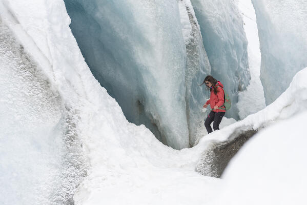 Girl at Morteratsch glacier, Morteratsch, Engadine, canton of Graubunden, Switzerland