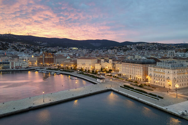 Molo Audace  and Trieste during sunrise, Trieste, Friuli Venezia Giulia, Italy, Europe