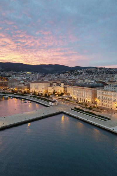 Molo Audace  and Trieste during sunrise, Trieste, Friuli Venezia Giulia, Italy, Europe