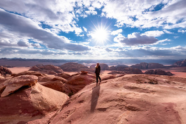 A girl observing the Wadi rum desert, south Jordan, Middle east, Asia