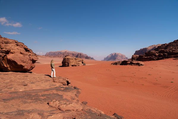 A girl observing the Wadi rum desert, south Jordan, Middle east, Asia
