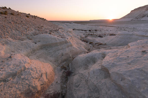 Rock formations at sunset at Boszhira at Caspian Depression desert, Aktau, Mangystau region, Kazakhstan