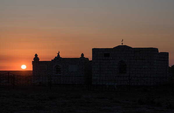 Ancient kazakh cemetery known as Kulbarak Ata at sunrise at Caspian Depression, Aktau, Mangystau region, Kazakhstan