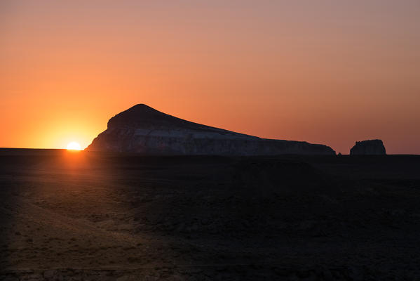 Silhouette of Sharkala mount at sunset at Caspian Depression, Aktau, Mangystau region, Kazakhstan