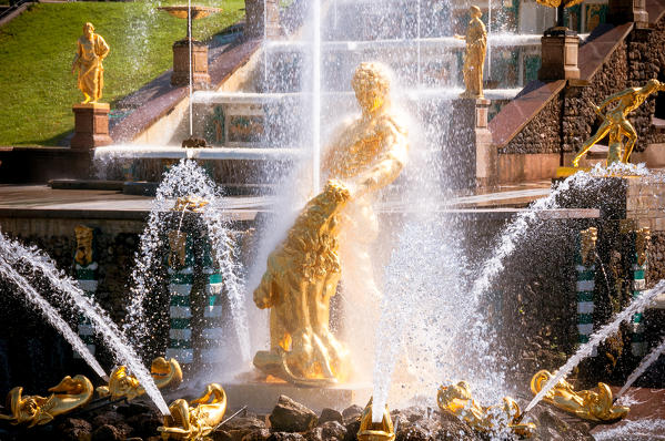 Golden statues of the fountain Grand Cascade of Peterhof, Saint Petersburg, Russia