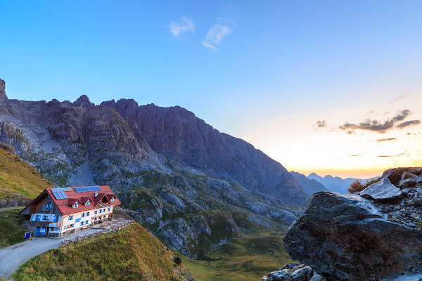 Summer sunrise at the Rifugio Marinelli, below the Monte Coglians and the Creta delle Chianevate, in the Carnic Alps, Udine province, Friuli Venezia-Giulia region, Italy