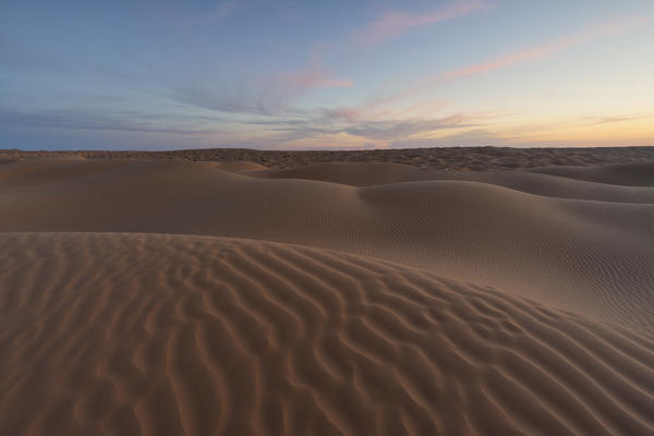 Sunset around Camp Mars village in the sand dunes, Sahara desert, Tunisia, Northern Africa.