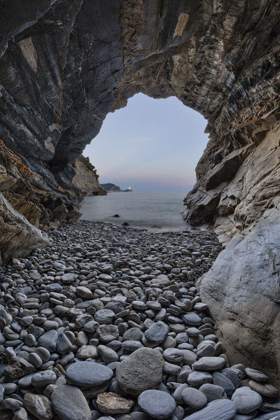 sunset from the cave, overlooking the island of Palmaria, Porto Venere, La Spezia province, Liguria district, Italy, Europe