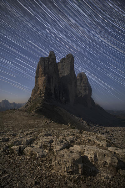 Startrails in summer night, over Tre Cime di Lavaredo, Drei Zinnen, Three Peaks of Lavaredo, Dolomites, Veneto, South Tyrol, Italy, Europe 