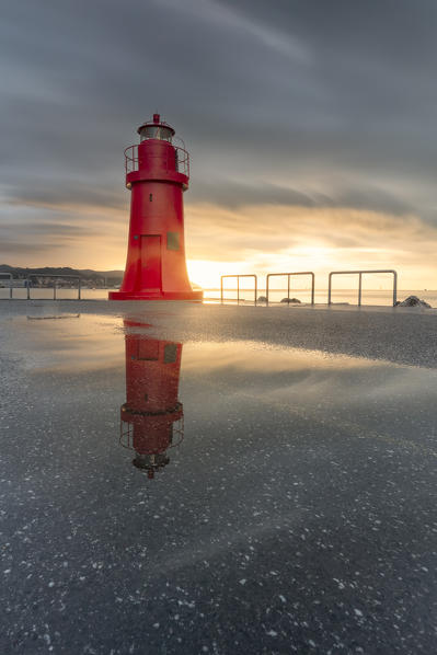 a magical sunset whit lighthouse at La Spezia harbour, municipality of La Spezia, La Spezia Province, Liguria district, Italy, Europe