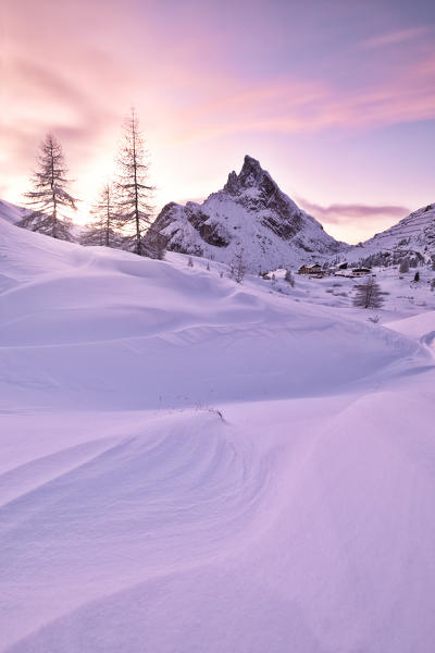 A magical violet sunset, taken at Falzarego Pass, Dolomites, municipality of Cortina d'Ampezzo, Belluno province, Veneto district, Italy, Europe.

