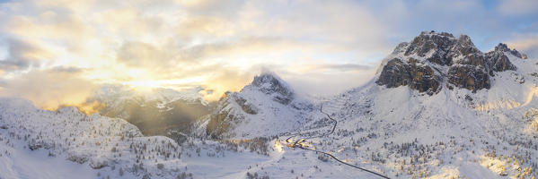 Panoramic aerial view of the Falzarego Pass at sunset, Dolomites, municipality of Cortina d'Ampezzo, Belluno province, Veneto district, Italy, Europe.