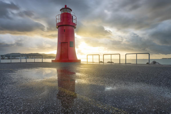 golden sunrise at the lighthouse of the port of la spezia, La Spezia province, Liguria district, Italy, Europe.
