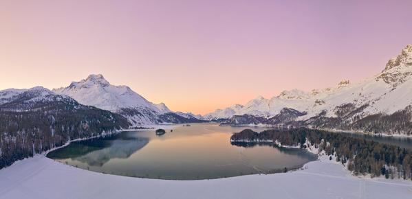 aerial view of Silsersee taken by drone a cold and windy winter morning, Lake Sils, Engadin Valley, canton of Graubunden, Switzerland, Europe.