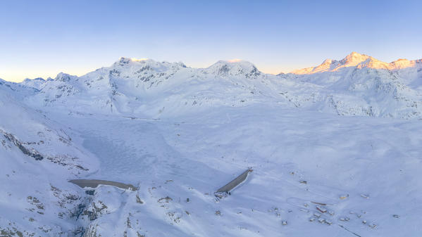 aerial panoramic view taken by drone at sunset of the Spluga Pass, Valtellina, municipality of Madesimo, Sondrio province, Lombardia district, Italy, Europe