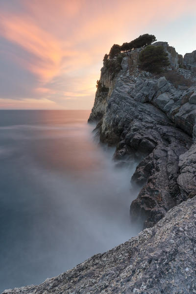 a colorful summer sunset along the cliff of Palmaria Island, municipality of Porto Venere, La Spezia province, Liguria district, Italy, Europe