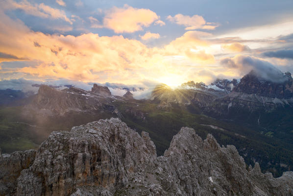 an explosive and colorful summer sunset taken by the drone, near the Cason di Formin mountain, Dolomites, municipality of Cortina d'Ampezzo, Belluno province, Veneto district, Italy, Europe