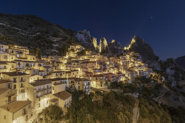 night view of the village of Castelmezzano during a cool summer evening, with the Lucanian Dolomites in the background, municipality of Castelmezzano, Potenza province, Basilicata district, southern Italy, Europe