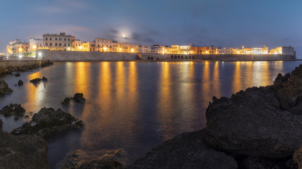 the seafront of Gallipoli taken during a warm summer evening, with a full moon in the sky, municipality of Gallipoli, Lecce province, Apulia district, Italy, Europe