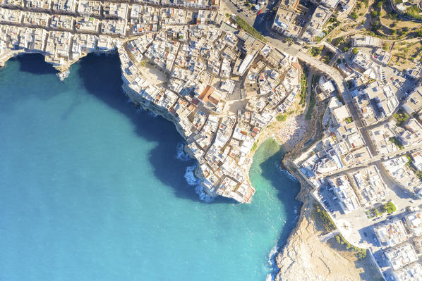 aerial view taken by drone of the splendid seaside village of Polignano a Mare, during a splendid summer day, municipality of Polignano a Mare, Bari province, Apulia district, Italy, Europe