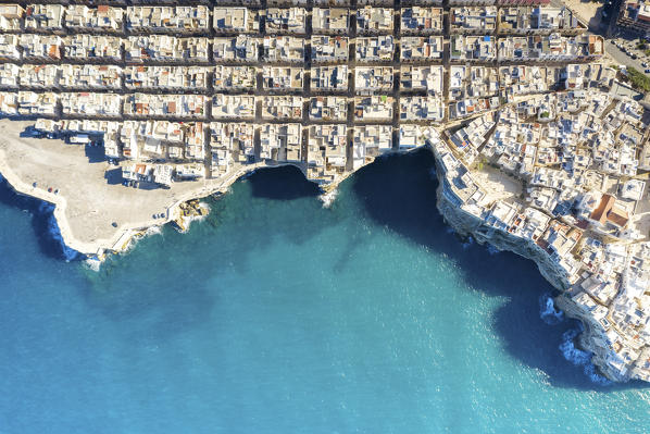 aerial view taken by drone of the splendid seaside village of Polignano a Mare, during a splendid summer day, municipality of Polignano a Mare, Bari province, Apulia district, Italy, Europe