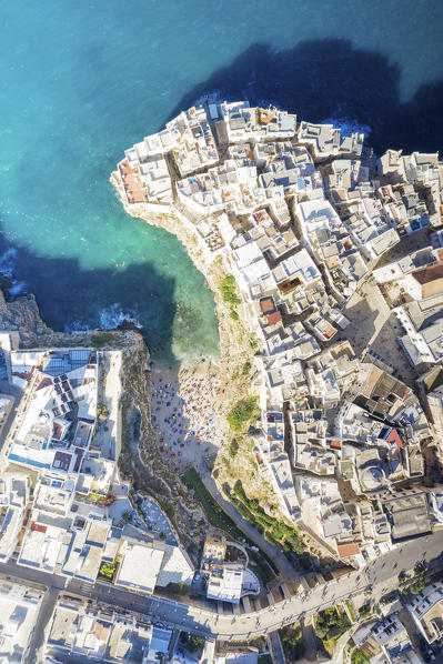aerial view taken by drone of the splendid seaside village of Polignano a Mare, during a splendid summer day, municipality of Polignano a Mare, Bari province, Apulia district, Italy, Europe