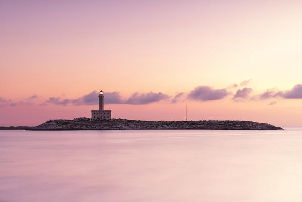 view of the Vieste lighthouse, during a warm summer sunrise, municipality of Vieste, Foggia province, Apulia district, Italy, Europe