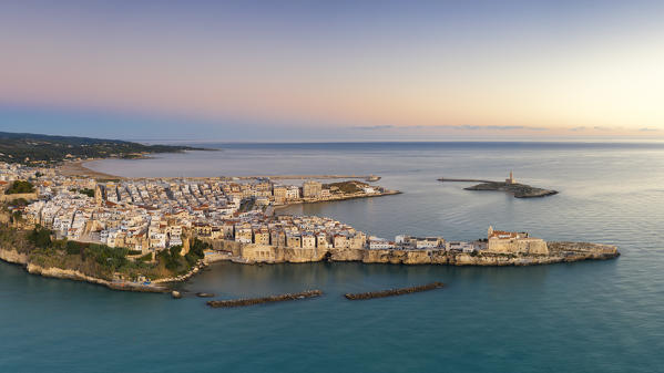 aerial view of the historic center of Vieste, taken during a summer sunrise, municipality of Vieste, Foggia province, Apulia district, Italy, Europe