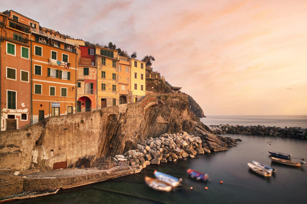 Colours sunset in fisherman village of Riomaggiore, National Park of Cinque Terre, UNESCO World Heritage Site, municipality of Riomaggiore, La Spezia province, Liguria district, Italy, Europe
