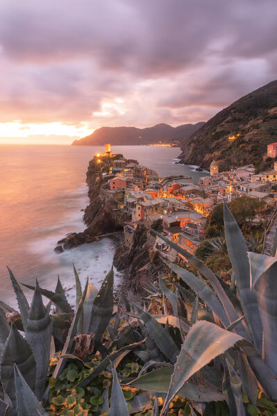 a warm light envelops the old village of Vernazza, during an autumn sunset, UNESCO World Heritage Site, National Park of Cinque Terre, municipality of Vernazza, La Spezia province, Liguria district, Italy, Europe