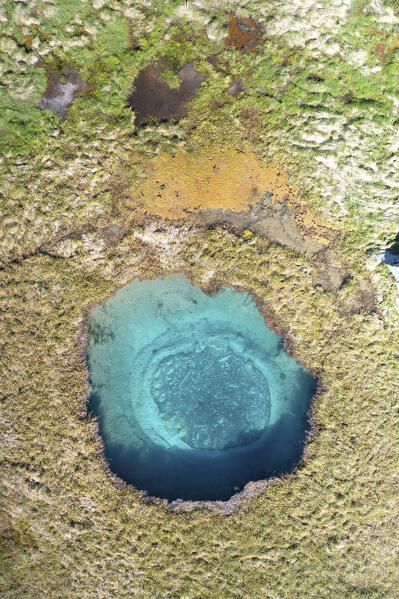 aerial view taken by drone of blue hole near to Madesimo, Orobie Alps, Valtellina, municipality of Madesimo, Sondrio province, Lombardy district, Italy, Europe