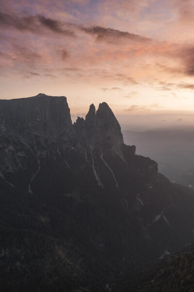 aerial view of Alpe di Siusi/Seiser Alm, Dolomites, South Tyrol, Italy. The sunset over the Alpe di Siusi with the peaks of Sciliar. Bolzano province, Trentino-Alto Adige district, Italy, Europe
