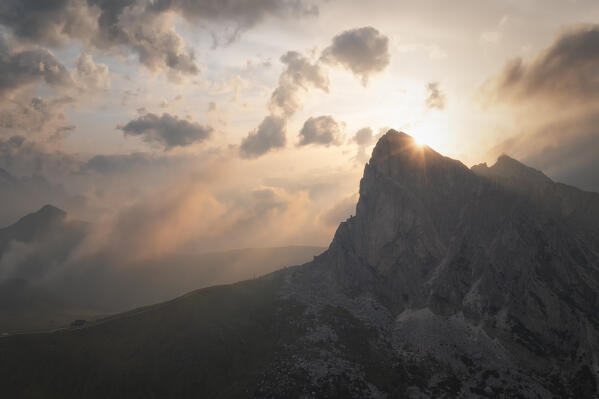 aerial view taken by drone of Ra Gusela mountain, during a warm summer sunset, Giau pass, Dolomiti, Belluno province, Veneto district, Italy, Europe