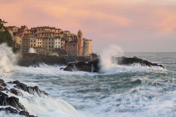 an amazing sunset captured along the cliffs near the historic villag of Tellaro, during a seastorm, Tellaro, municipality of Lerici, La Spezia province, Liguria district, Italy, Europe