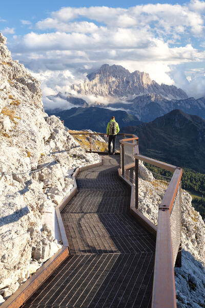 one hiker enjoy the beautiful landscape from the Lagazuoi to Civetta mountain, Dolomiti, Veneto district, Italy, Europe