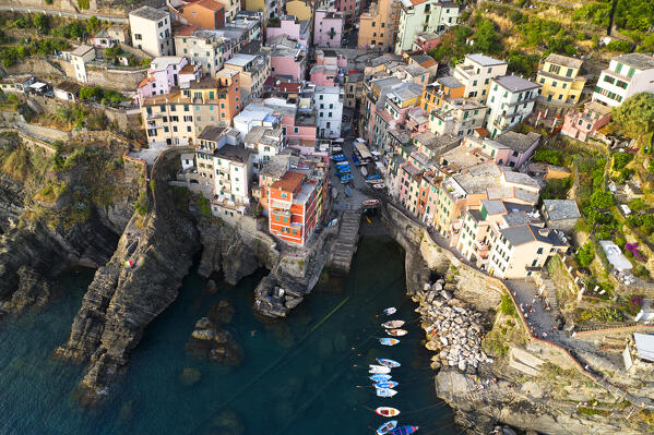 Aerial view taken by drone of touristic village of Riomaggiore, National park of Cinque Terre, La Spezia, Italy, Europe