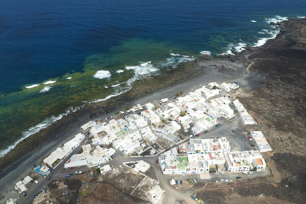 aerial view taken by drone of a little fisherman village of El Golfo, Lanzarote, Canary Island, Spain, Europe