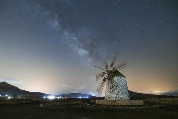 the milky way over the famous Molino de Villaverde during a summer night, Fuerteventura, Canary Island, Spain, Europe