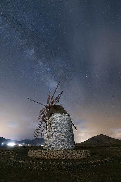 the milky way over the famous Molino de Villaverde during a summer night, Fuerteventura, Canary Island, Spain, Europe