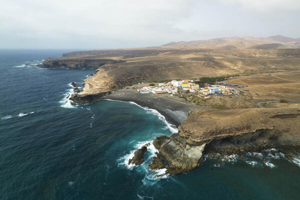 aerial view taken by drone of a little fisherman village called Puerto de la Pena,  during a summer day, Fuerteventura, Canary Island, Spain Europe
