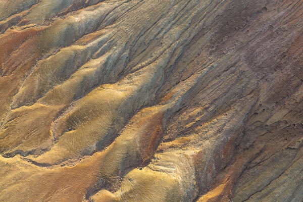 aerial vertical abstract view taken by drone of the Montaña Roja volcano, during a summer day, Natural Park of Corralejo, Fuerteventura, Canary Island, Spain, Europe