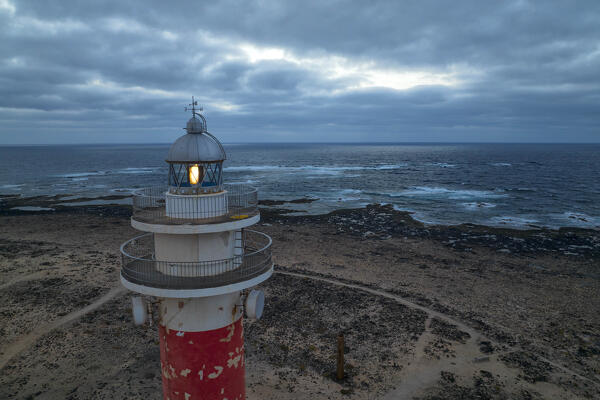 aerial view taken by drone of the Toston Lighthouse during a summer blue hour, Fuerteventura, Canary Island, Spain, Europe